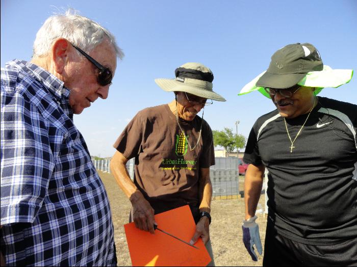 Volunteers and Urban Harvest leader Gary Ray Sher laying out the garden beds in 2011